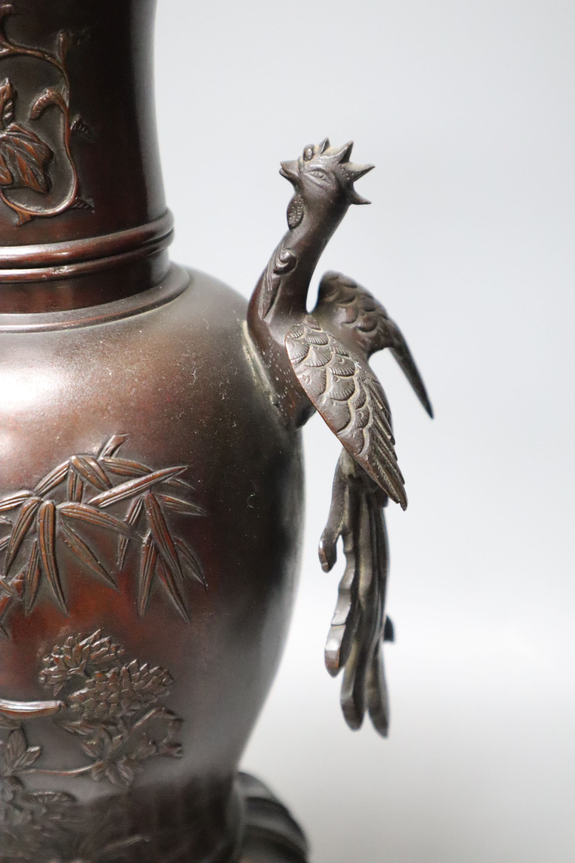 A 19th century Japanese Meiji period bronze censer vase, the handles formed as phoenix, height 41cm